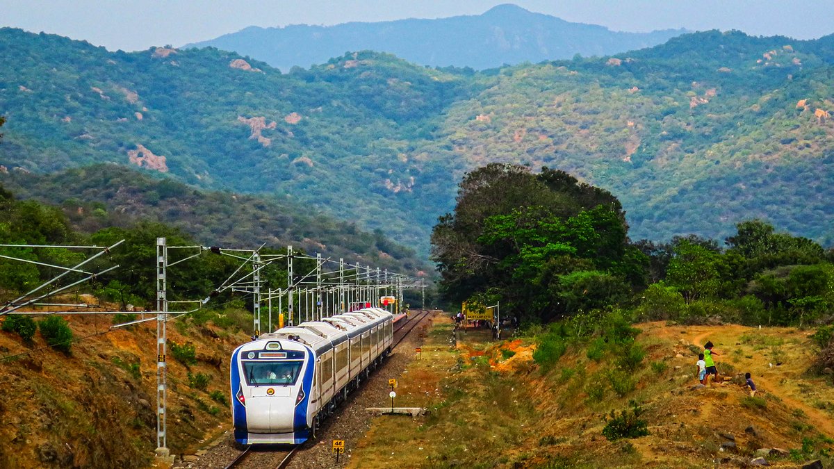 20642 #Coimbatore Jn - #Bengaluru Cantt #VandeBharatExpress Passing Through Muttampatti Railway Station, Surrounded by Beautiful #Mountains 🌄

PC: Natarajan C

#SouthernRailway #TrainSpotting #Photography #Scenic #TrainJourney