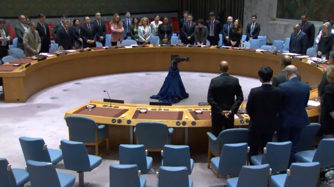 UN Security Council members stand and observe a moment of silence in remembrance of Iranian President Seyyed Ebrahim Raisi, Foreign Minister Hossein Amir-Abdollahian and other officials who died in a helicopter accident on 19 May