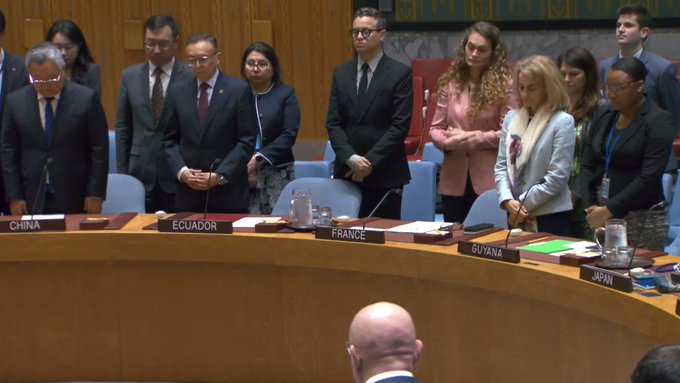 Close up of UN Security Council members stand and observe a moment of silence in remembrance of Iranian President Seyyed Ebrahim Raisi, Foreign Minister Hossein Amir-Abdollahian and other officials who died in a helicopter accident on 19 May