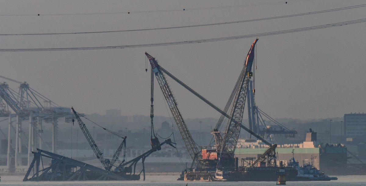 ByTheBayPhotos's tweet image. Last night's view of the Dali at the Francis Scott Key Bridge site before the ship was moved this morning. 

#KeyBridge #KeyBridgeNews #KeyBridgeCollapse #Baltimore