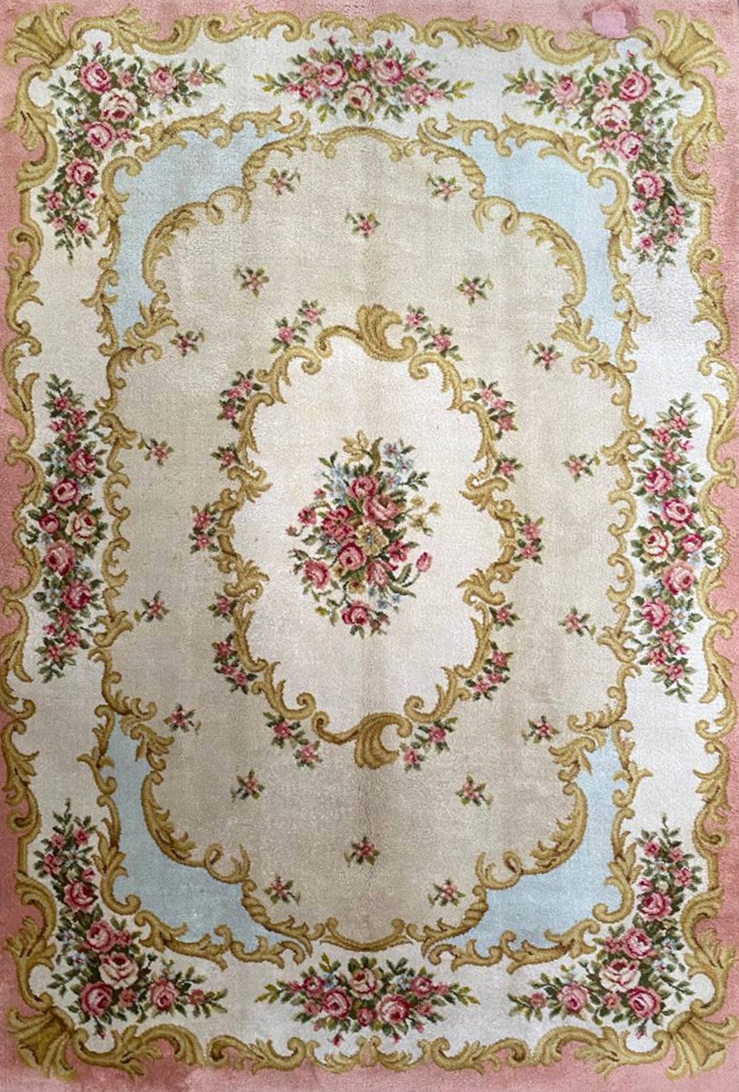 Elevate your home decor with a 6x10 Antique Savonnerie Rug from France. This beige and pink beauty adds timeless elegance to any space. #SavonnerieRug #AntiqueRug #DallasDesignDistrict #DallasTX