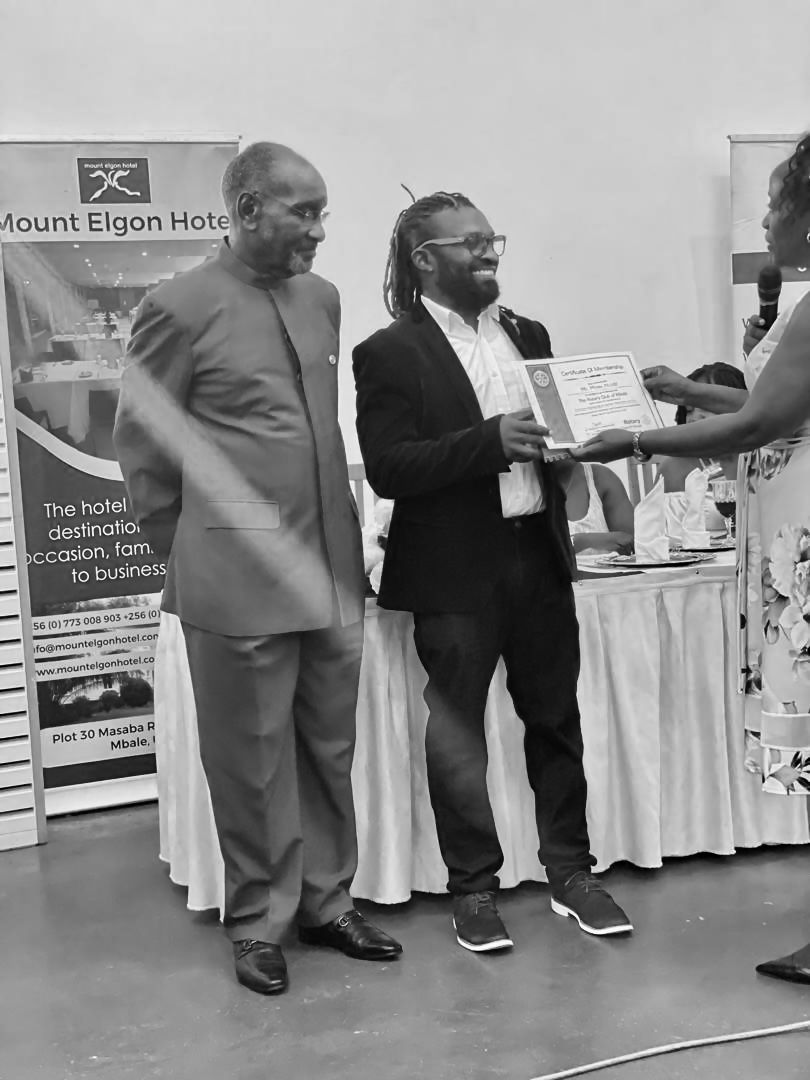 @Rotary 
DGE @AnneNkutu inducting me into Rotary. My old man standing beside me is an honorary member of @RotaryKololo, thank you, sir. @RotaryMbale1964 let's make magic together. Congratulations to all inductees and PE Deborah Siango
#TheMagicOfRotary