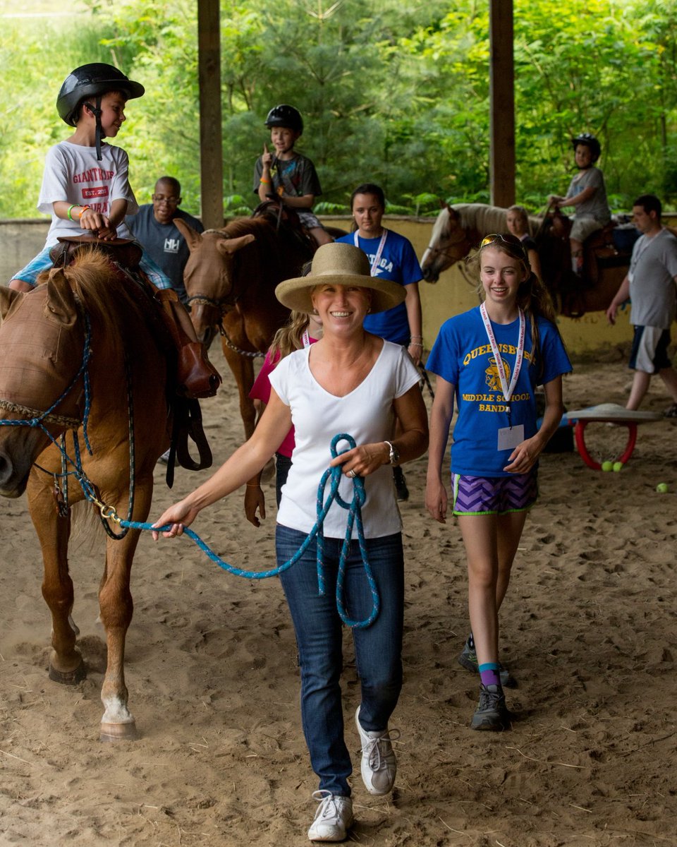 Hey! Clea Newman again. These are some of my favorite photographs from days spent at SeriousFun camps. You might notice that they all include our incredible campers and their animal pals...