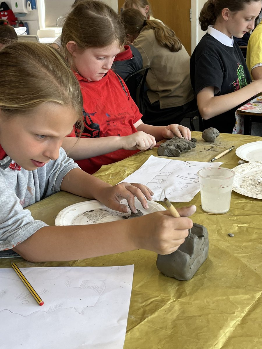 Year 6 are now using clay to sculpt icebergs as part of a piece of work looking at climate change in Antarctica .