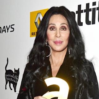 And its a very happy 74th birthday to Cher. And er, who's that cat?
