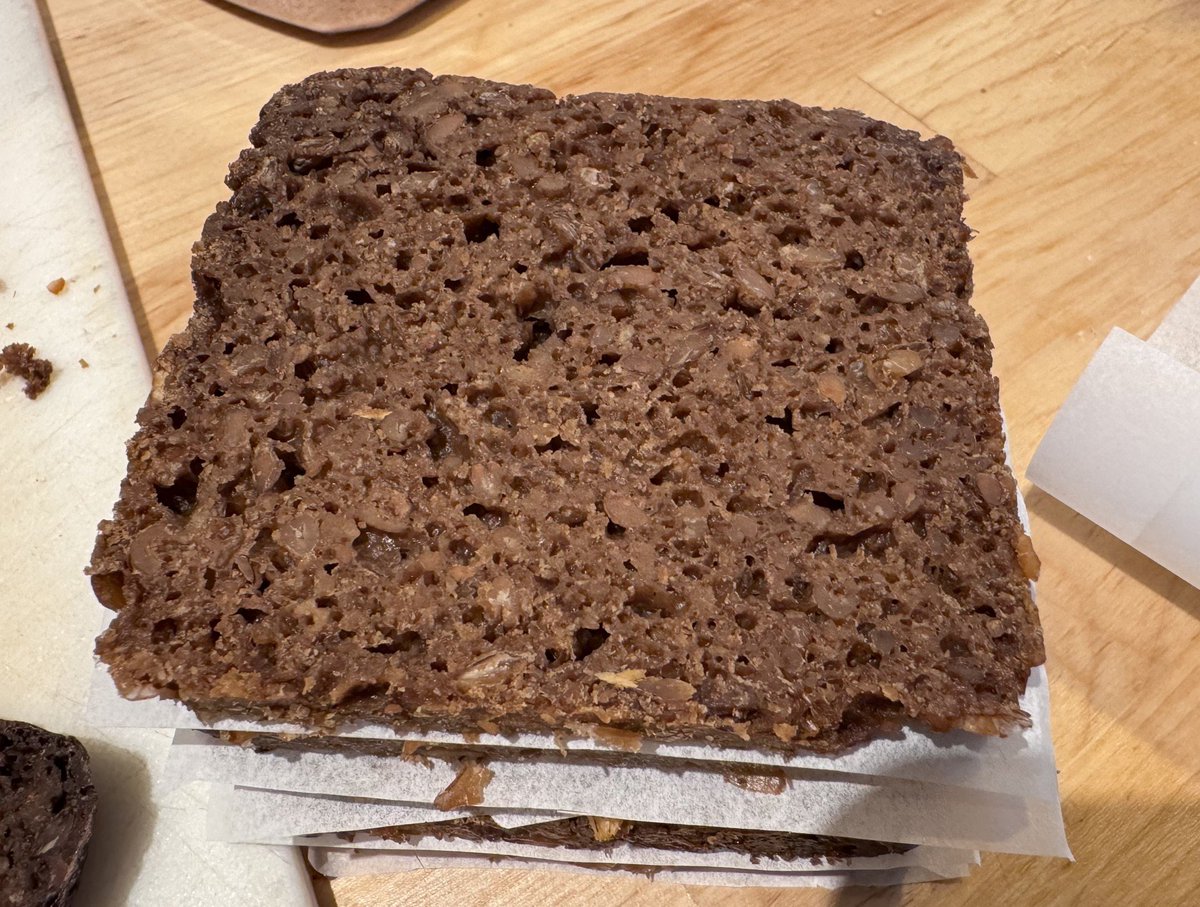 DocDellaire's tweet image. Homemade pumpernickel bread - 4 days of prep (including 14 hours bake and 24 hours curing). 
This puppy is made from pure rye berries, ground into flour meal in a spice grinder, and dark rye flour from Bulk Barn #GermanBread #Pumpernickel #Sourdough