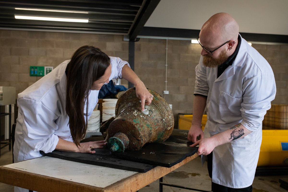 Naval History and Heritage Command archaeological conservators have begun treatment assessments on the ship’s bell of USS Jacob Jones (DD 61) in the Conservation, Research, and Archaeology Laboratory on the Washington Navy Yard.