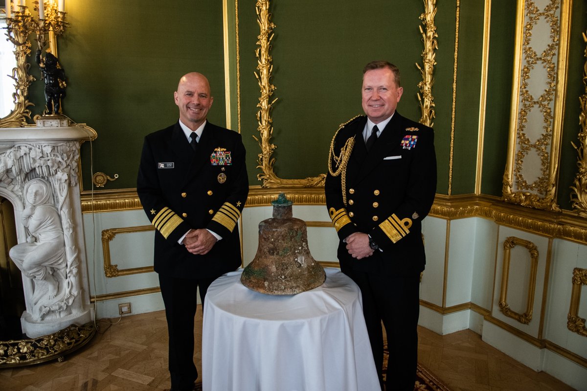 Adm. James W. Kilby, vice chief of naval operations, left, accepted custody of the bell on behalf of the U.S. Navy from U.K. Vice Adm. Martin Connell, second sea lord and deputy chief of naval staff, right. during a ceremony at Lancaster House in London on May 15.