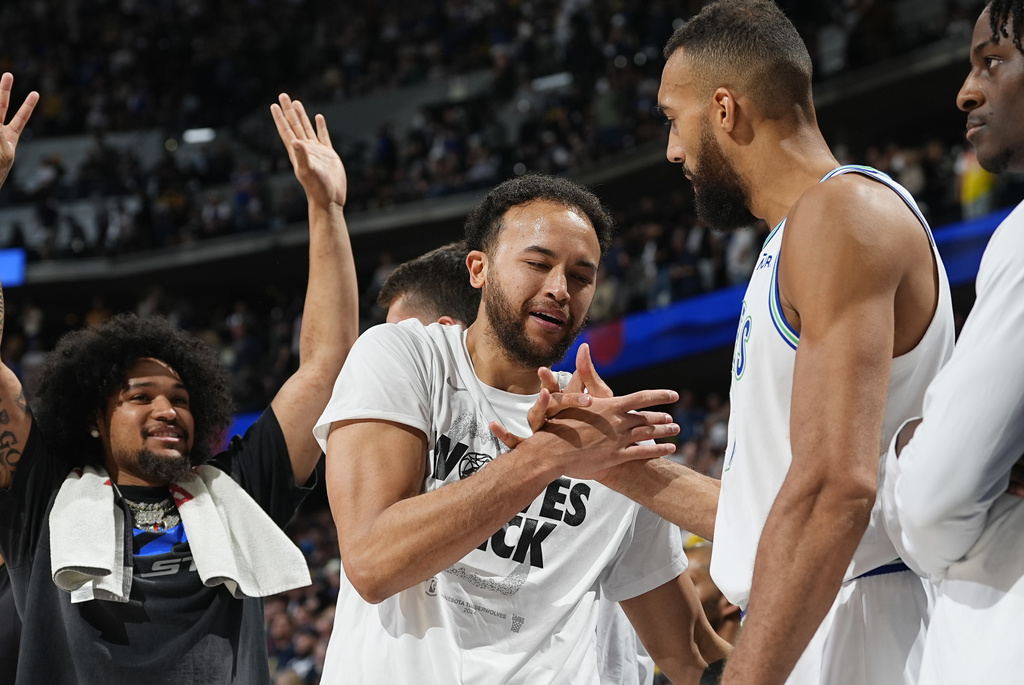 This Associated Press photo from last night speaks volumes. Think about where these two were this time last year, the team as a whole leading the league in technical fouls. This year, incredibly emotionally stable, tight bond all around. #WolvesBack