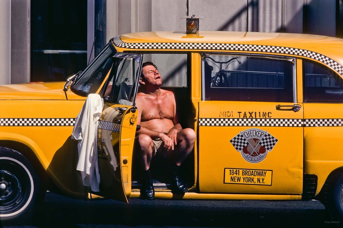 Jay Meisel - Taxi driver taking a sunbath. New York, 1983