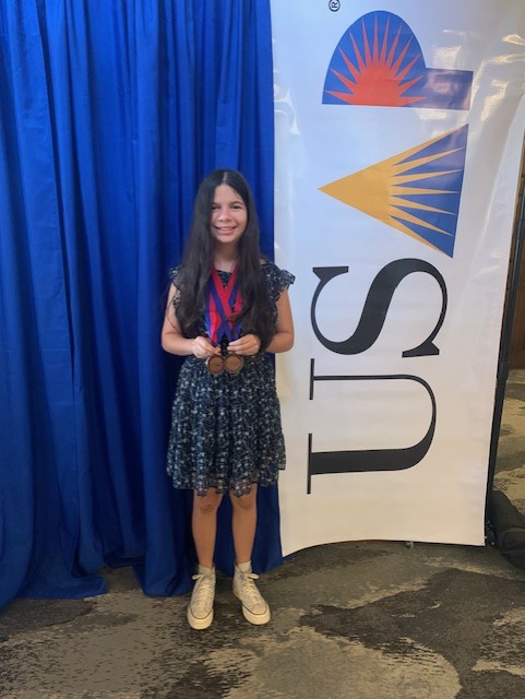 Alexis Lugo participated in the Academic Pentathlon National competition on Friday , May 17th. She placed 3rd and took home the bronze medal in Literature and Fine Arts for 7th graders competing as individuals. She also finished in fourth place overall for her cumulative score.