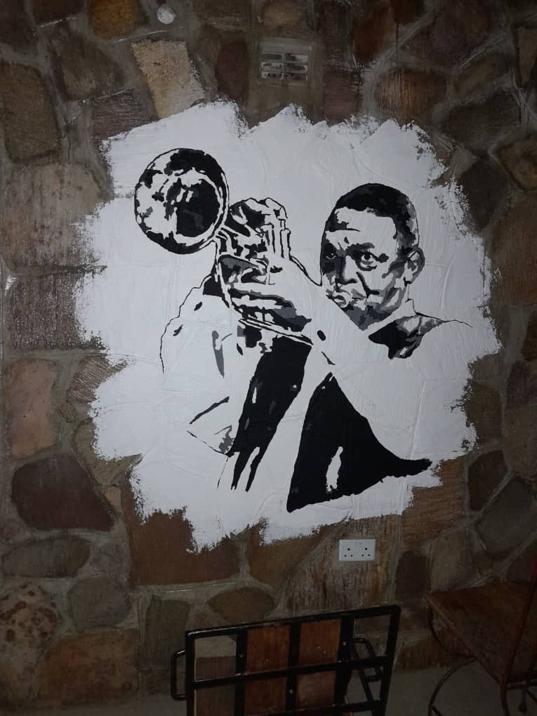 The first of the dozen murals to grace PanAfrika Restaurant: here, our brother Hugh Masekela, and then Miriam Makeba, Tuku Mtukudzi, Thomas Mapfumo, Caiphus and Letta, Gwangwa, Fela and Stella Chiweshe. And as you approach the restaurant - Bob Marley and Marvin Gaye. All will be