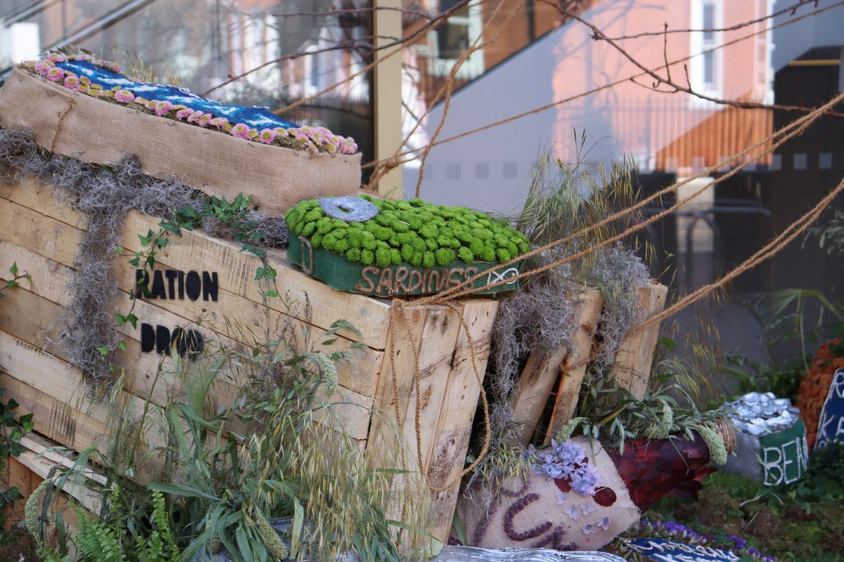 NAM_London's tweet photo. 🌸🪻Voting Time 🪻🌸

You may have spotted a new installation outside the Museum! 
We’ve installed an interpretation of a ‘Ration Drop’ as our Chelsea in Bloom entry!

If you like our display, please vote for us as People’s Champion:
https://t.co/AcZ2A1sSYq

#ChelseaInBloom https://t.co/OXpgrE30Ge