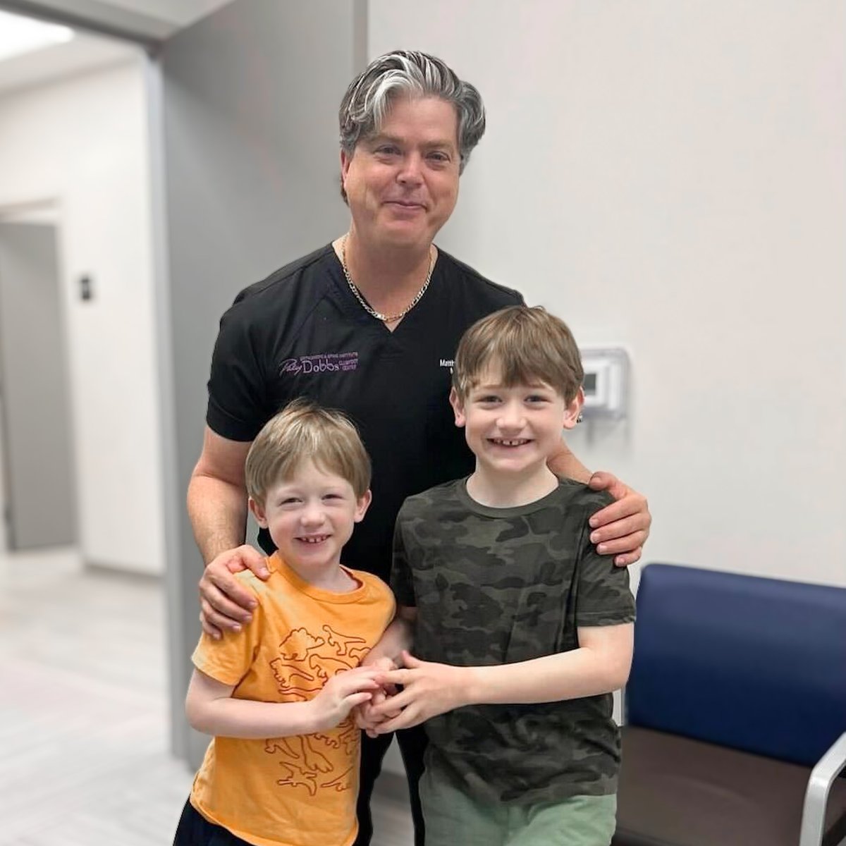 Children from across the globe journey to receive exceptional care from Dr. Matthew Dobbs. These two brothers, both successfully treated for clubfoot by Dr. Dobbs, showcase their radiant smiles. Their joy is a testament to his expertise and the life-changing impact of his work.