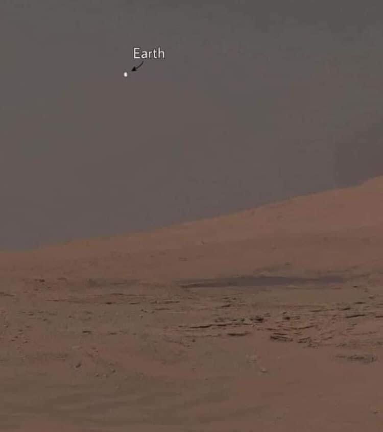 An image of the Earth from the surface of Mars, 55 million km away, is a real image. More than 7 billion people live on a grain of dust in a world we cannot realize its end.