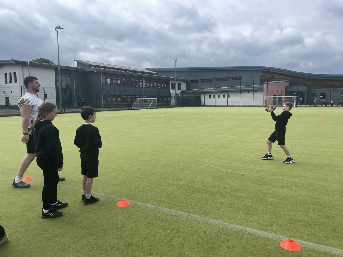 Working on our passing skills. 🏈