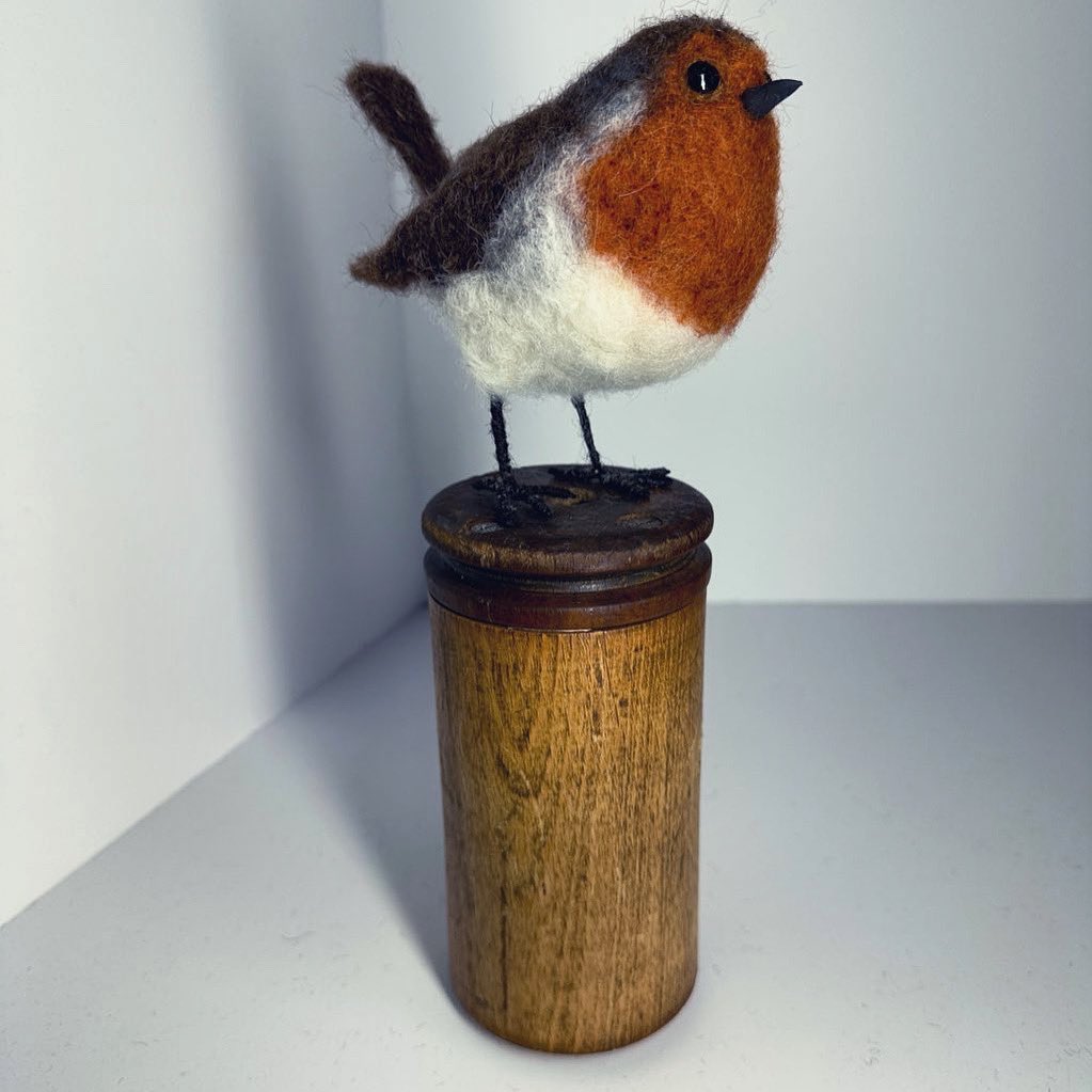 A needle felted Robin on a lovely wooden eBay find!