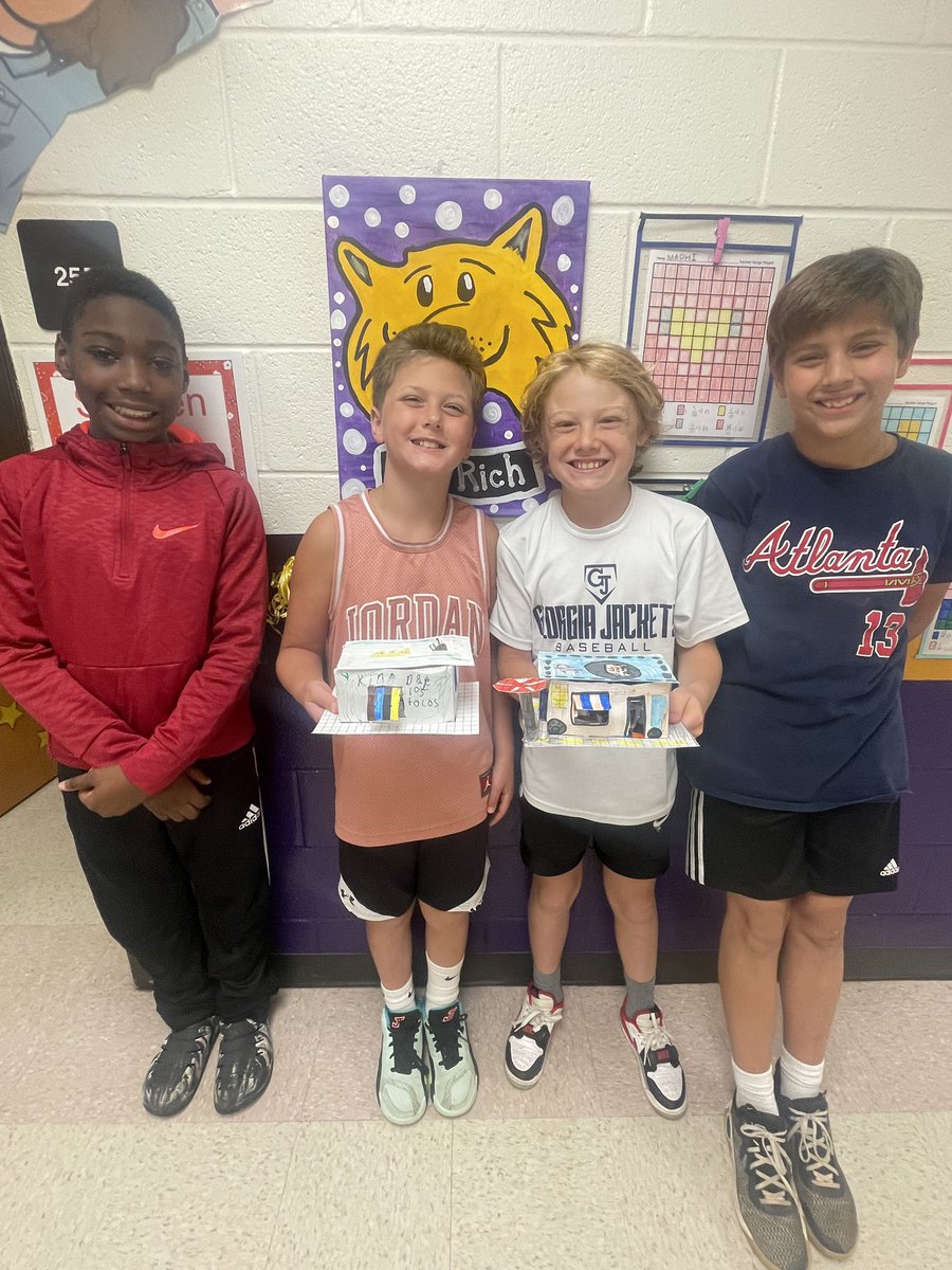 4th graders have been completing a capstone project involving math, writing, economics, and technology to design their taco truck business. Today they presented their business plans, truck models, and menus. The end of this project was celebrated with yummy tacos!