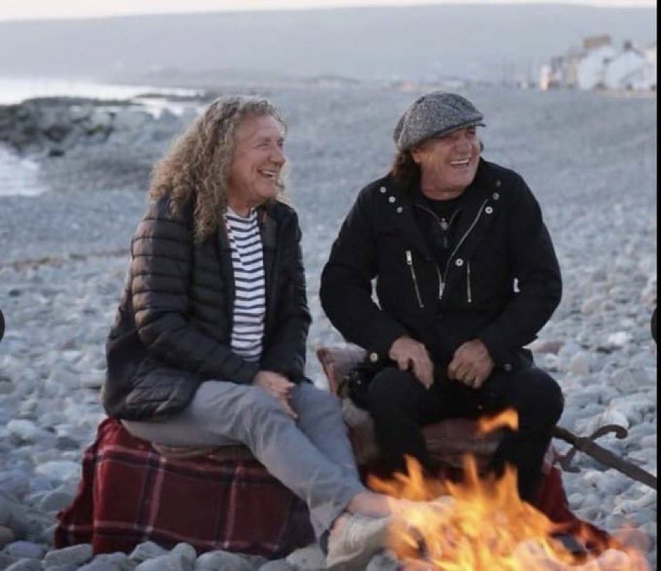 Robert Plant from Led Zeppelin and Brian Johnson from AC/DC sitting on the beach in front of a bonfire talking about life. How many anecdotes these two legends will have to tell...