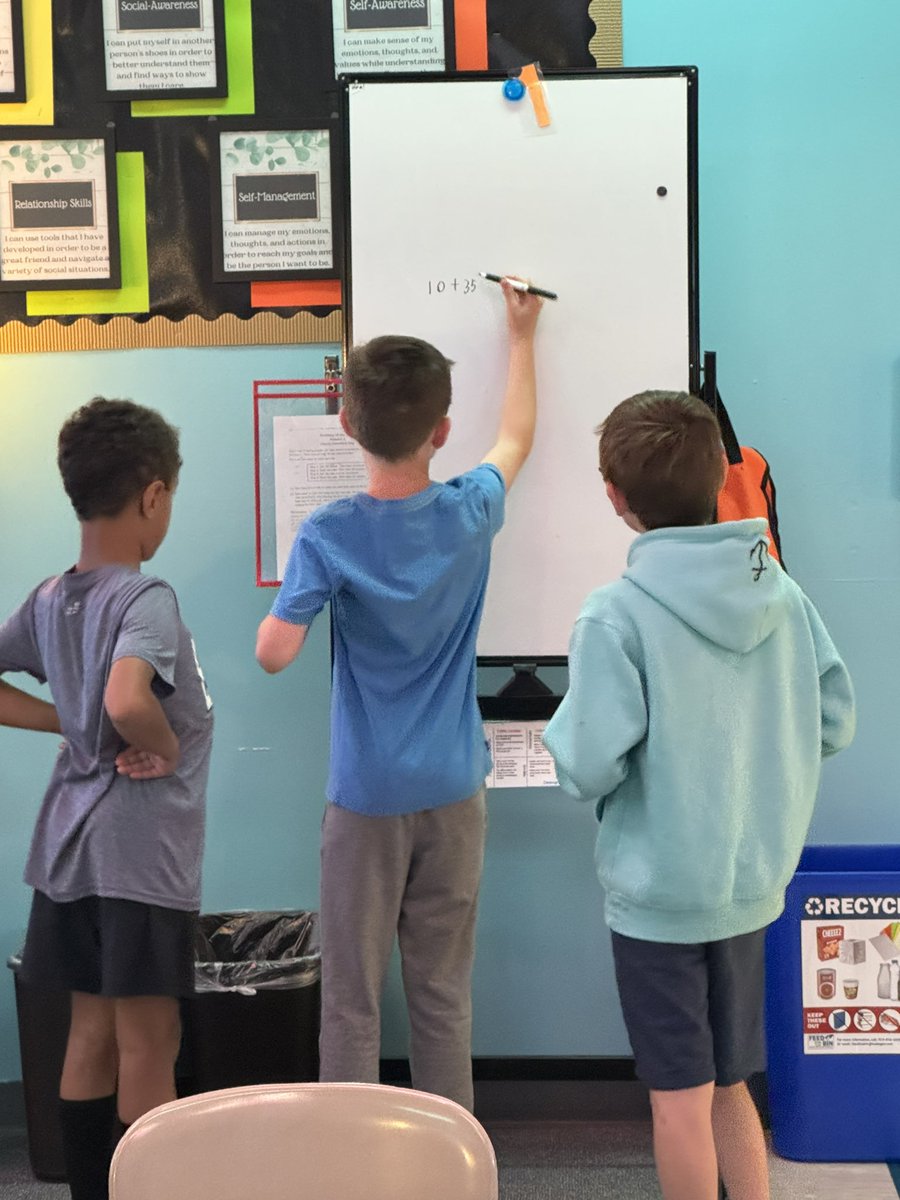 WLES_AIG's tweet photo. 3rd Grade Math AIG working at our #buildingthinkingclassrooms boards fir the first time today! 
1. No earasing = learning from mistakes
2. No writing your own thinking = sharing your thoughts with others! 
@pgliljedahl @WCPSS_ALS https://t.co/QH3G2KCgQx
