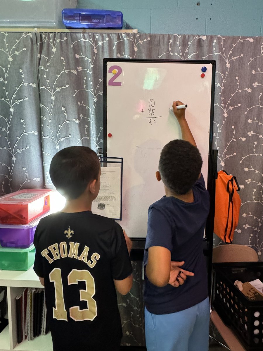 3rd Grade Math AIG working at our #buildingthinkingclassrooms boards fir the first time today! 1. No earasing = learning from mistakes 2. No writing your own thinking = sharing your thoughts with others! @pgliljedahl @WCPSS_ALS