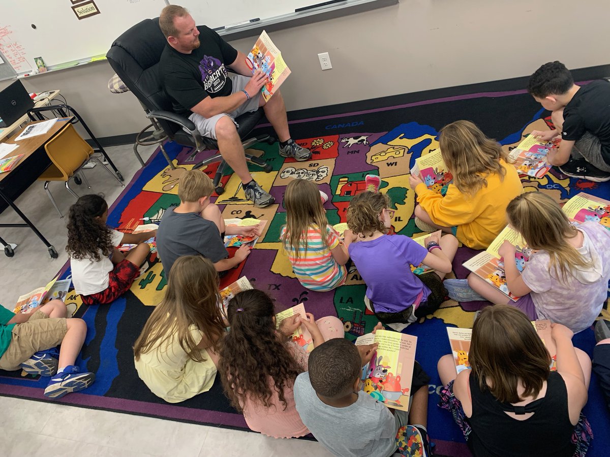 EWA_MCS's tweet photo. The Central varsity football coach read to Mrs. Hyneman's class and left a book for each student. https://t.co/Hz6Gtwi1ID