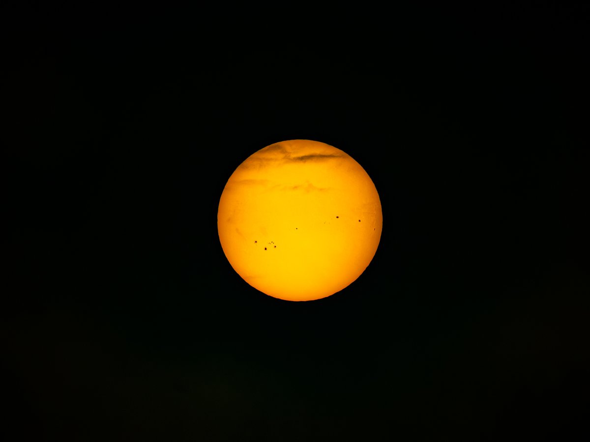 Our side of the solar disc this morning during the foggy sunrise with many sunspots visible.