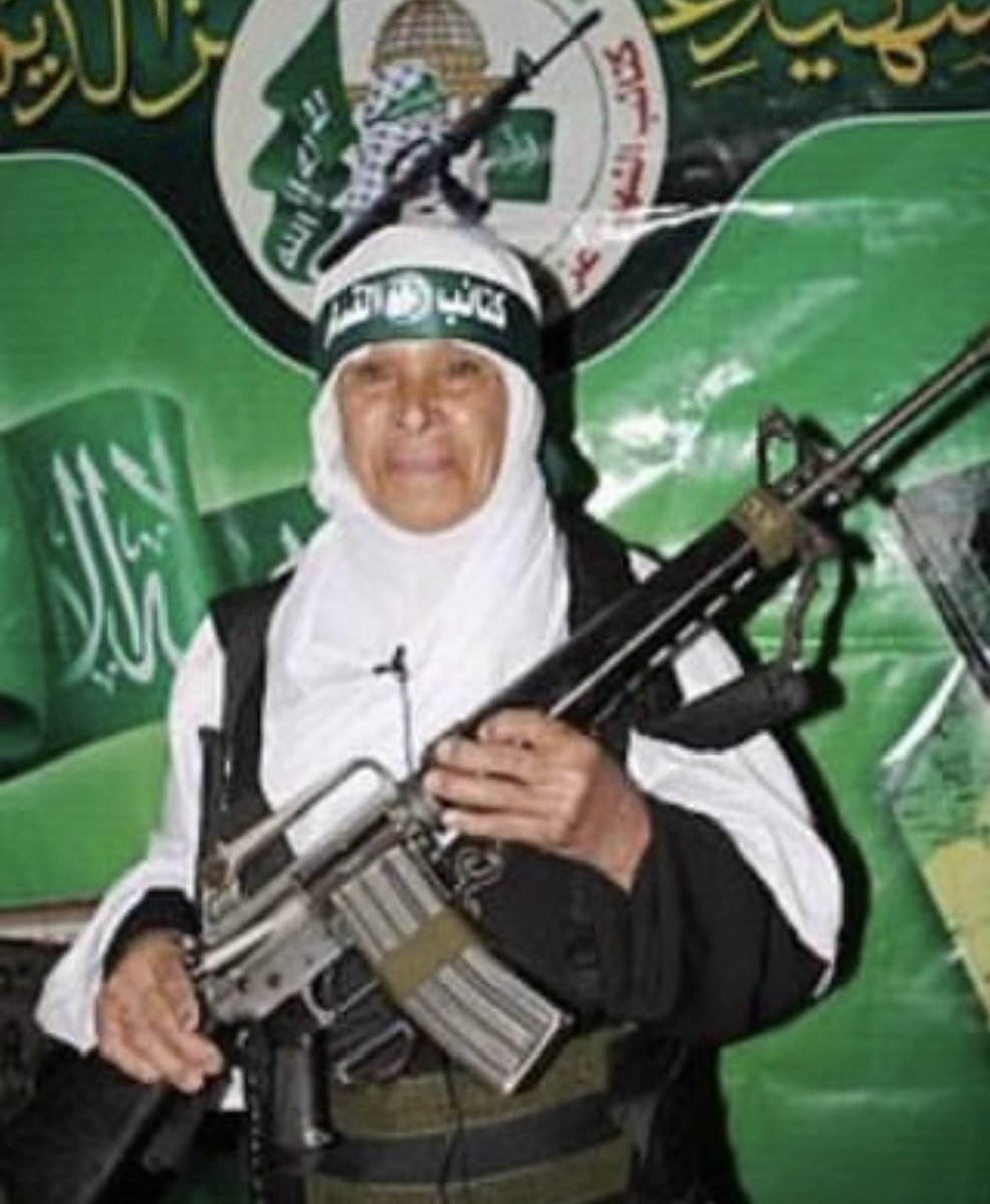 photo of Fatima Al-Najjar from Jabalya, Gaza, steadfast 57 year old female fighter of the Qassam Brigades that was besieged in the Al-Nasr Mosque during the zionist invasion of Beit Hanoun in 2006. may her martyrdom remain righteous.