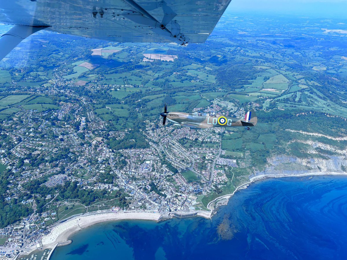 drjuliapaul's tweet photo. What an amazing day! My mum had organised for my dad to go up in a #spitfireplane as a delayed 80th birthday present - & we got to accompany him in a 6-seater plane & take photos! Amazing to see #lymeregis from above - and on such a beautiful day! Huge thanks to @spitfiresdotcom https://t.co/UmS3KVWLdS