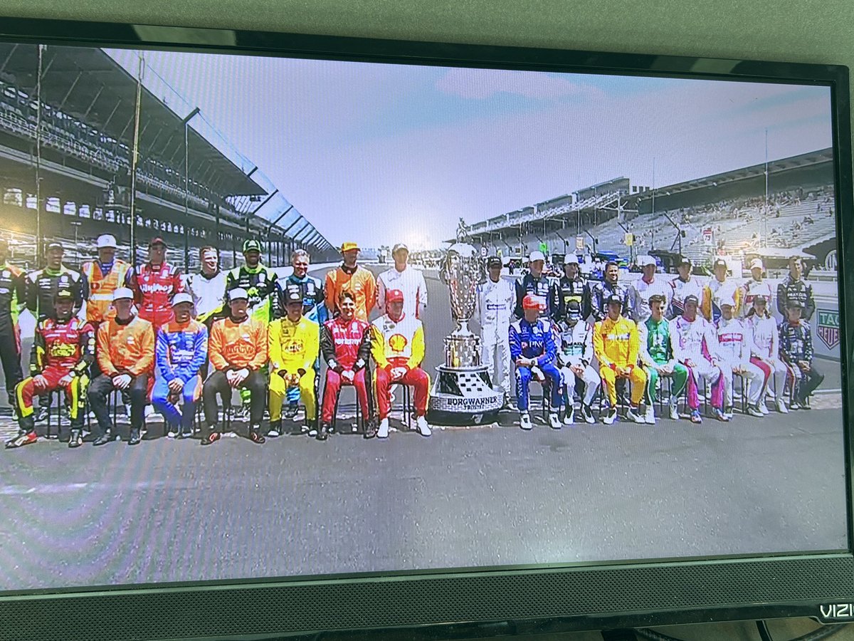 Based on watching today’s practice @IMS I think we’re in for another great 500 Sunday. Photo: My booth view of the “class photo” before practice.