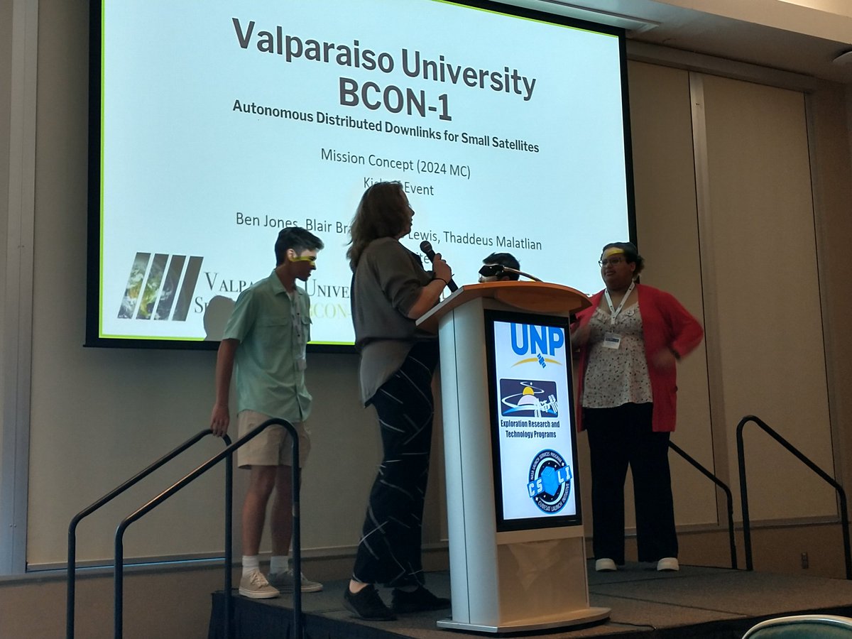 BCON satellite team introducing their mission concept at the University Nanosatellite Program kickoff event at <a href="/NASAKennedy/">NASA's Kennedy Space Center</a>