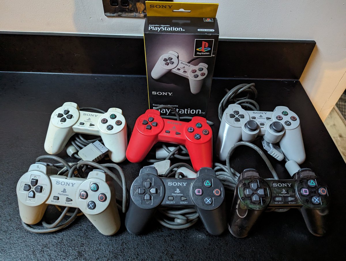 I've been slowly building up my Playstation 1 controller set and recently completed it, including the SCPH-1180e model which introduced the dual analog sticks. This was the precursor to the Dual Shock controller.