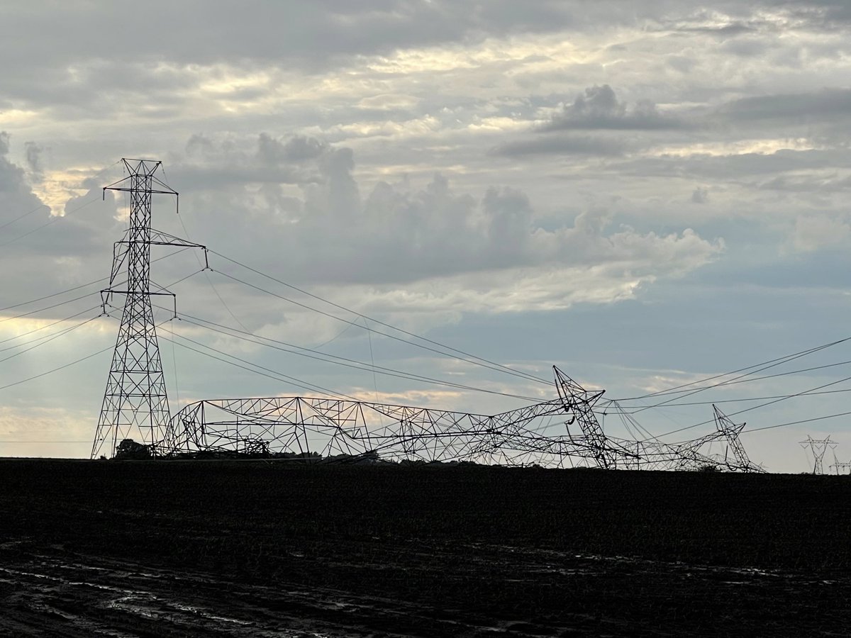 XLSarge's tweet image. A lot of utility poles and power lines down including transmission towers. These are on CR 400 S between CR 425 W and CR 500 W in Scipio Township La Porte County