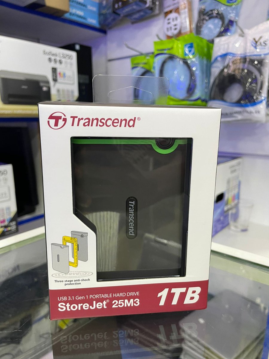 Transcend 1TB USB 3.1 Storejet 25M3 Portable Hard Drive Price 10700 Kes Call WhatsApp 0701846097 1TB Storage Capacity USB 3.1 Interface Transfer Speed 5Gb/s Bus-Powered Design 256-Bit AES Encryption Military-Grade Shock Resistance Internal Hard Drive Suspension System Quick