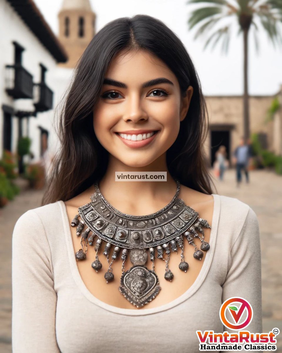 This necklace cascades into a beautifully designed central pendant, its ornate patterns and embossed details capturing the essence of traditional artistry. Shop Now: buff.ly/2WN78r1. #handmadejewelry #silvernecklace #statementjewelry #artisanmade #bohochic #vintagestyle