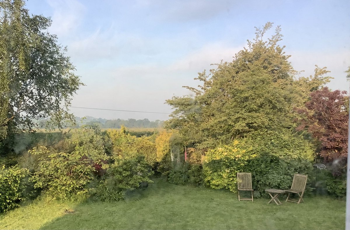 Good morning from the #WelshMarches. Early sun just beginning to creep across the grass. Chairs will be a warm spot for a cup of tea any minute.