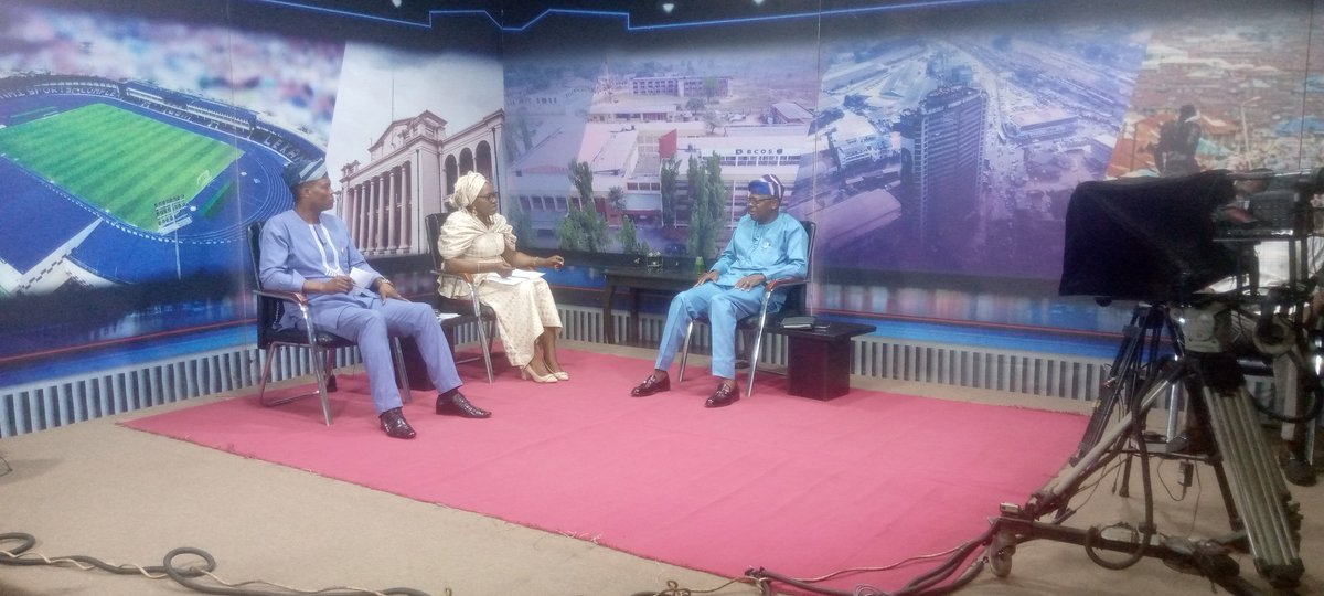 The Honourable Commissioner for Public Works and Transport, Professor Dahud Sangodoyin, and the presenters at the programme.