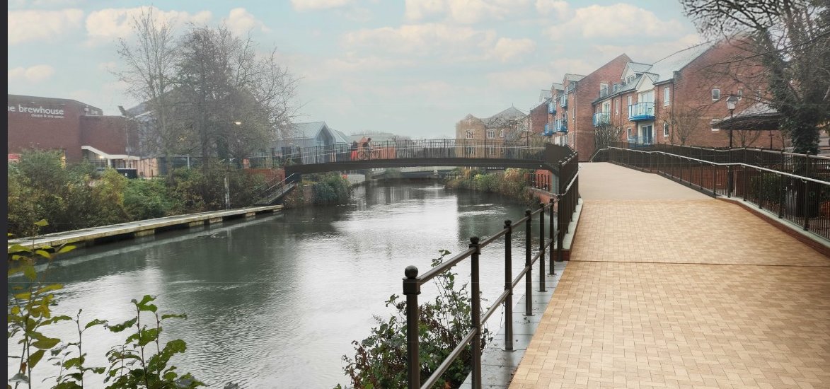 DanielMumby's tweet photo. A footbridge over the River Tone in #Taunton could soon be widened to provide part of a new #activetravel route between the town centre and the railway station: https://t.co/5sfQQOouXb #LDReporter #Somerset #CoalOrchard #Firepool #futurehighstreetsfund @tauntonareacyc1 https://t.co/AuXzXudO7P