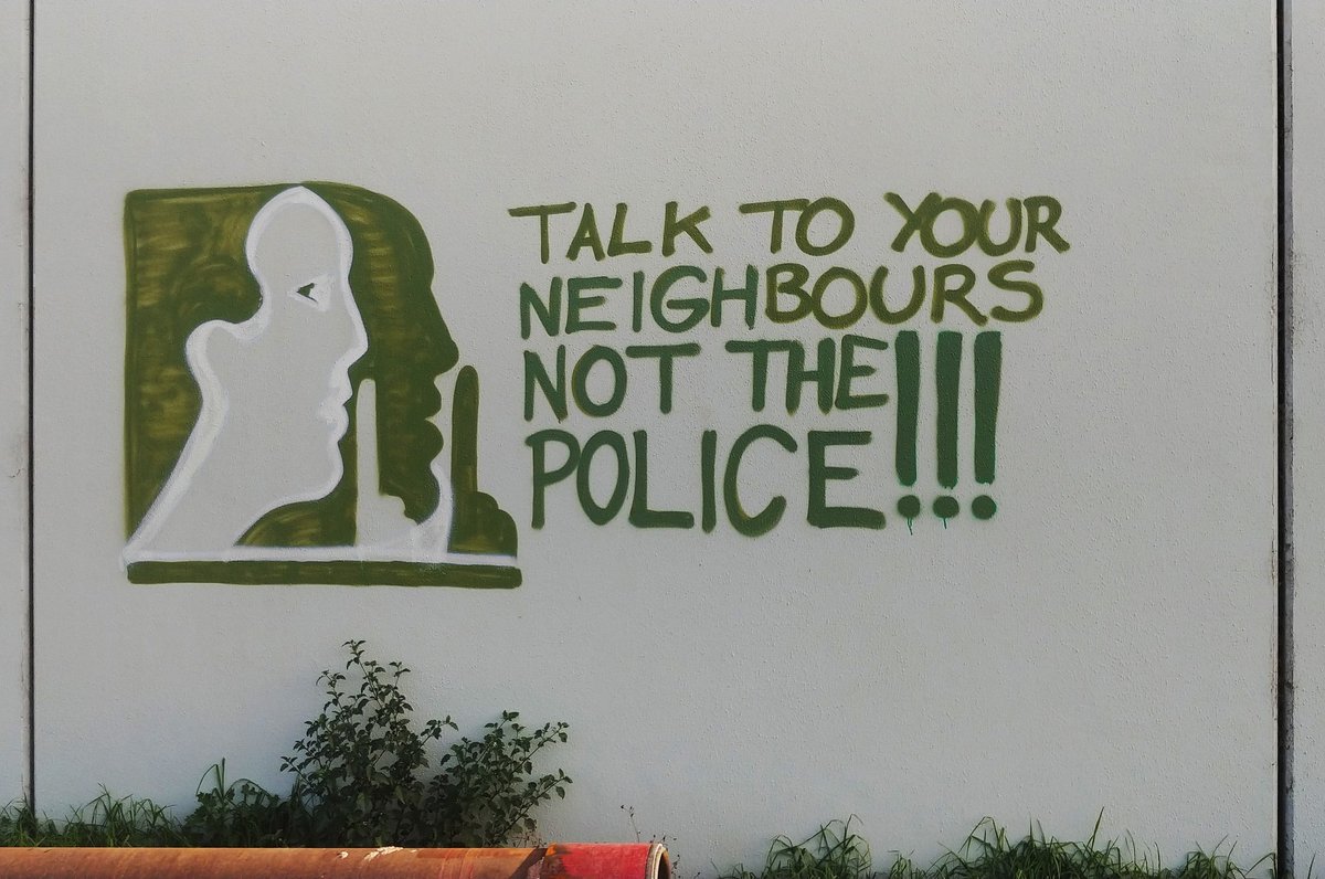 "Talk to your neighbours, not the police!"
Graffiti in Narrm/Melbourne parodying the 'Neighbourhood Watch' logo.
