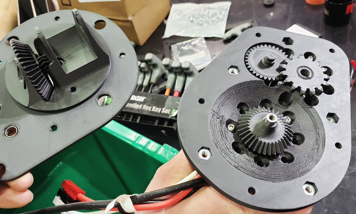 If you missed our Saturday Open House there's still time! We are Open tonight (Tuesday 5/21) from 6-8 pm! 
More info in previous posts.
Pictured: A carbon fiber nylon 3D printed swerve module we're testing, come check it out!