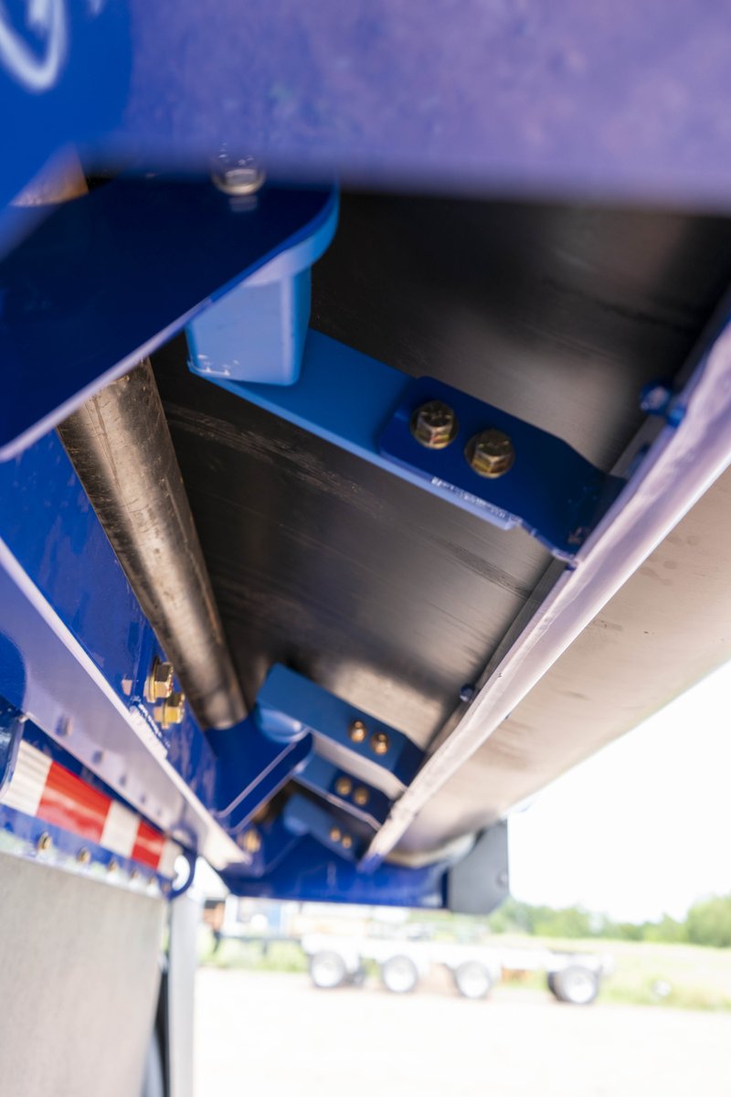 The optional compression belt scraper is perfect if you are hauling wet sticky material.