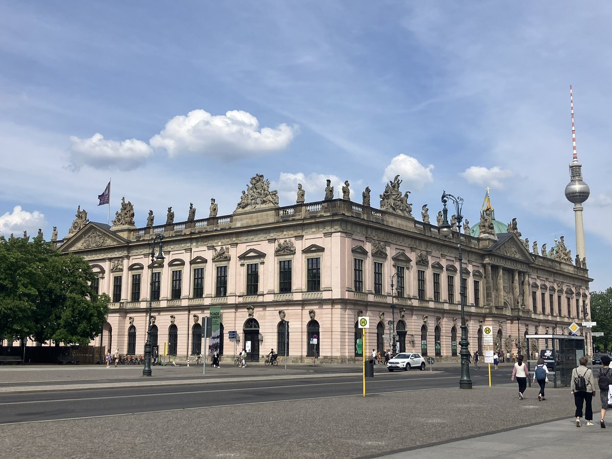 NiamhWycherley's tweet photo. Gotta love the pink buildings in Berlin! Here representing @YoungAcademyIrl with @oloughlindec and @agatawestern at a European young academies meeting. @MaynoothUni @EarlyIrishMU https://t.co/PlC2KoI8jf