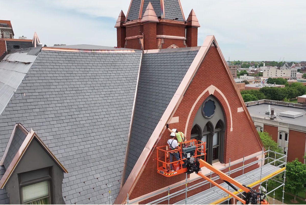 #SMARTWork: Local 36’s Jake Dickinson (left) and Elijah Wagner work to restore one of St. Louis's historic buildings – DuBourg Hall at Saint Louis University – by replacing all the copper on the roof. Great work, brothers! Photo courtesy of Local 36 and the Labor Tribune.