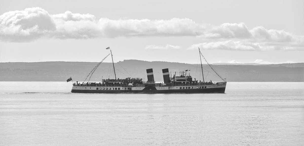 Making the most of the backlit scene #mono <a href="/PS_Waverley/">Paddle Steamer Waverley</a> departing Largs after an afternoon cruise of Loch Striven on day 3 of the 2024 season. <a href="/PSPS_UK/">PSPS</a> <a href="/NatHistShips/">National Historic Ships UK</a>