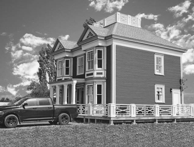 My B&W photo is this Victorian house in Woody Point. The town has a heritage designation for all the old buildings and homes that have been restored there. The Widows Walk on the roof is where wives looked out the harbour to see if their husband’s boat was coming in the harbour.
