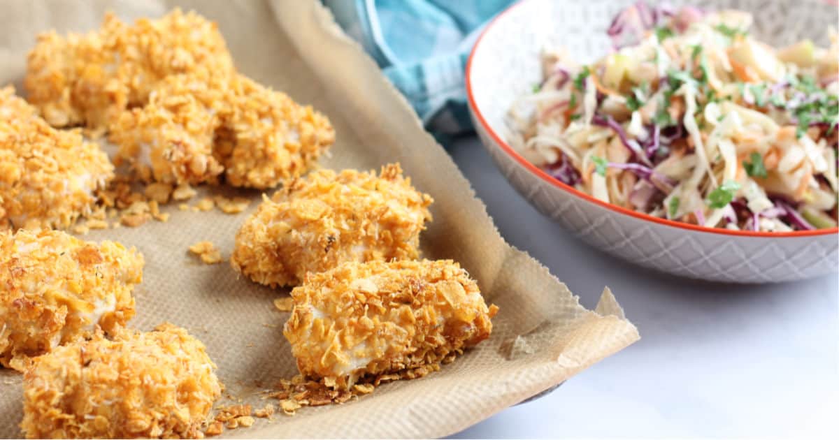 One of the kids favourite dinners! These Cornflake crumbed chicken nuggets are so much healthier than the shop-bought processed variety! Great with baked potatoes and beans for a quick and easy after school dinner! bit.ly/32ubKB4