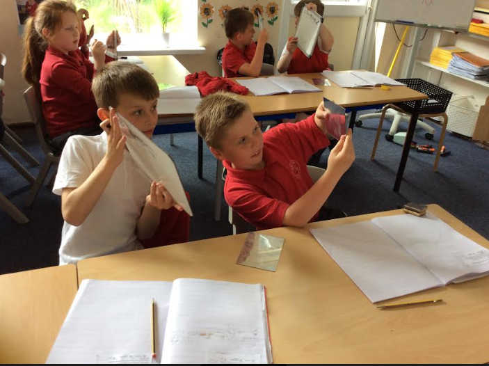 EastwayPrimary's tweet photo. Year 3 have been learning about reflection and how mirrors work. We have experimented with reflection by creating some 'fun-house selfies', 'mirror mazes' and 'reversal messages'. It was fun putting each other to the test! #EastwayScience https://t.co/gWjJEk3I8d