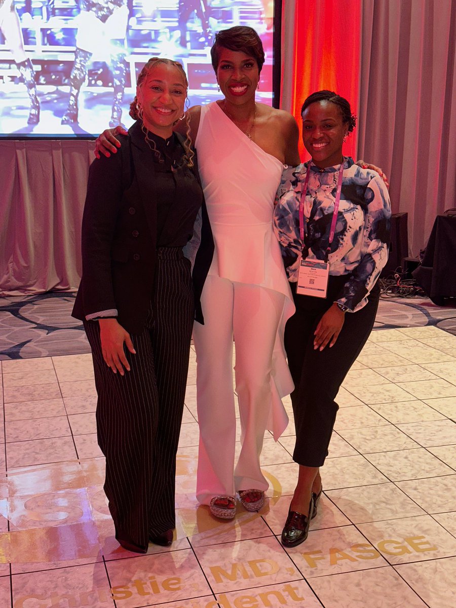 Current and former UAMS GI fellows enjoying the Presidential Plenary with ASGE President Jennifer Christie, MD.