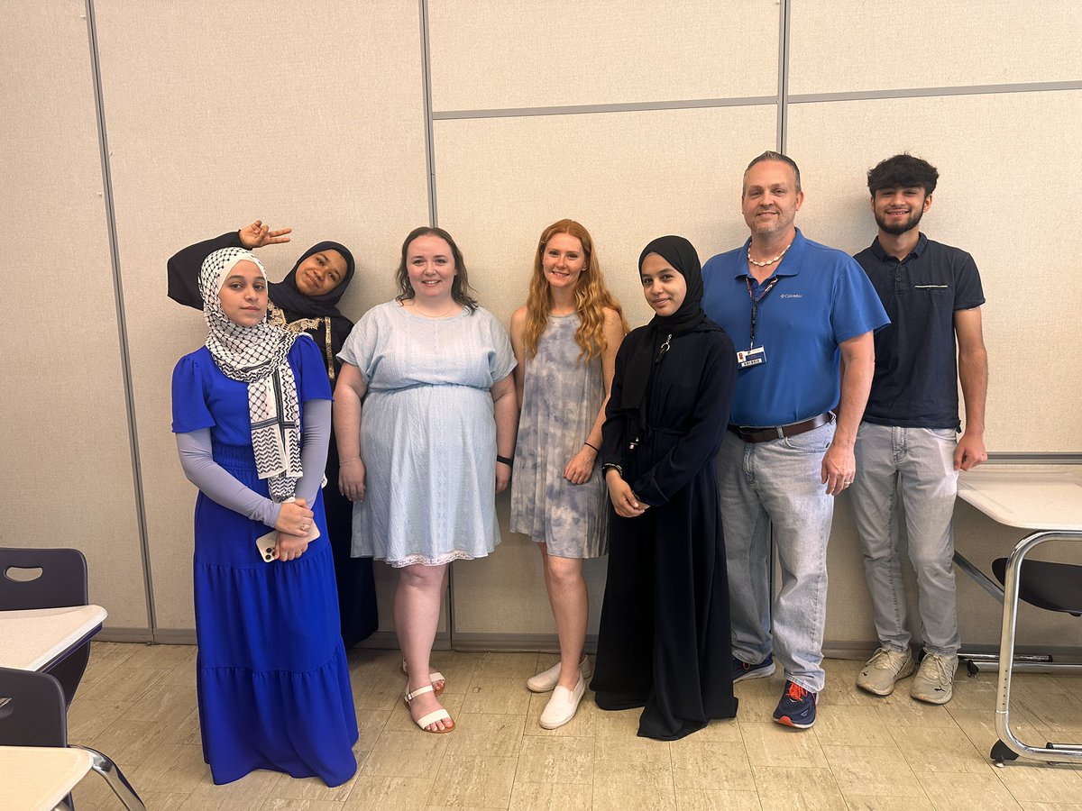 ENL staff and students twinning in blue for twin day 💙