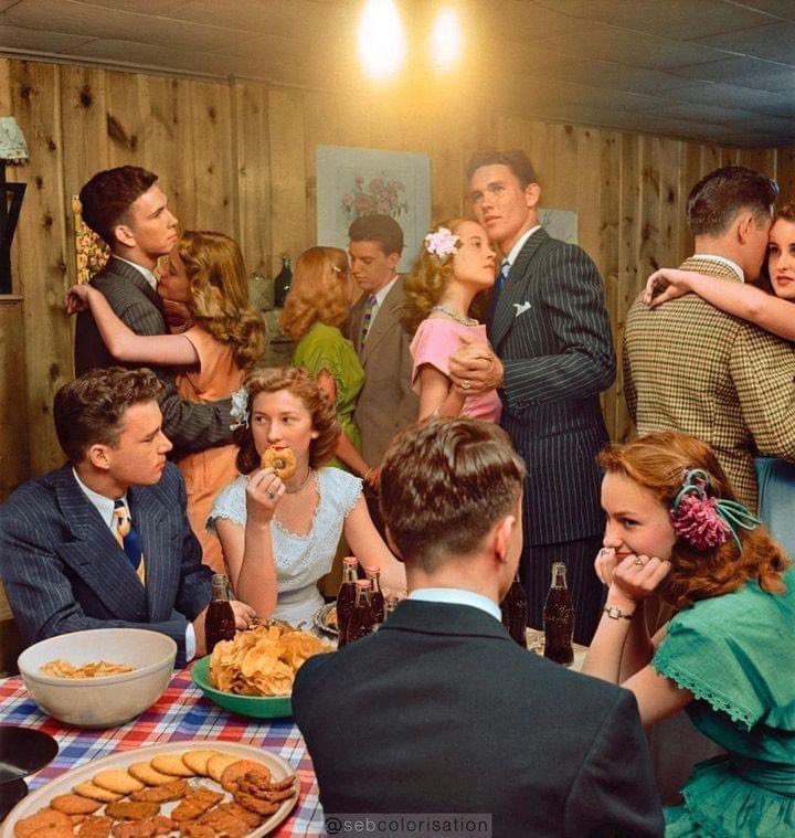 Teenagers at a party in Tulsa, Oklahoma, in 1947, photographed by Nina Leen. Look at the food: Cookies, chips, donuts, soda. Yet no one was fat. Credit: sebcolorisation